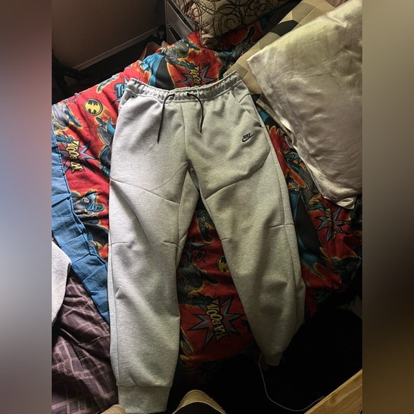 Gray Nike tech pants